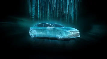 DRÄXLMAIER key visual. Turquoise car in front of a black background.