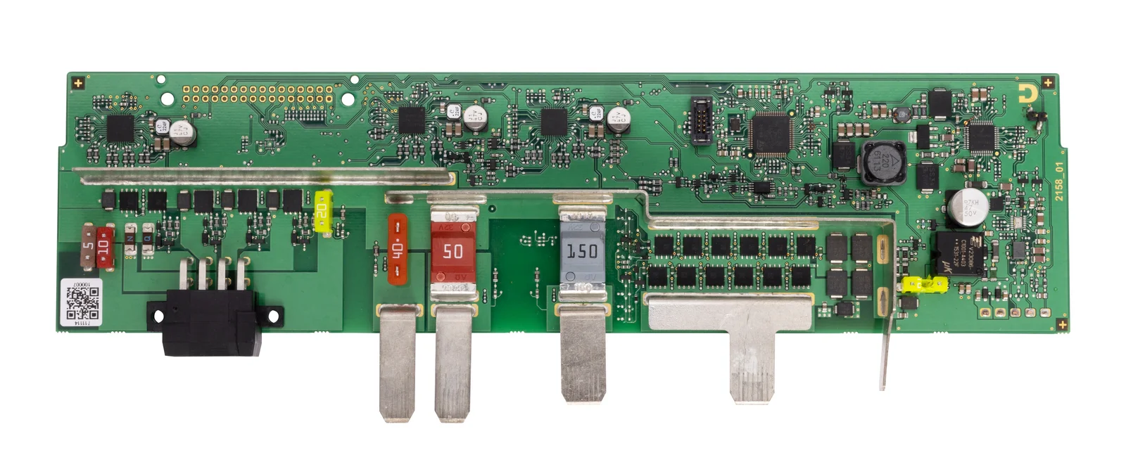 Green circuit board with various electronic components, including capacitors, resistors and connectors.