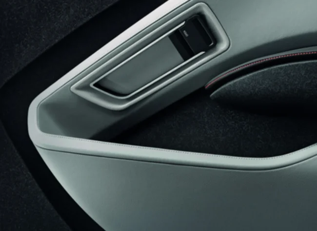 A dark-coloured door panel of a BMW i3.