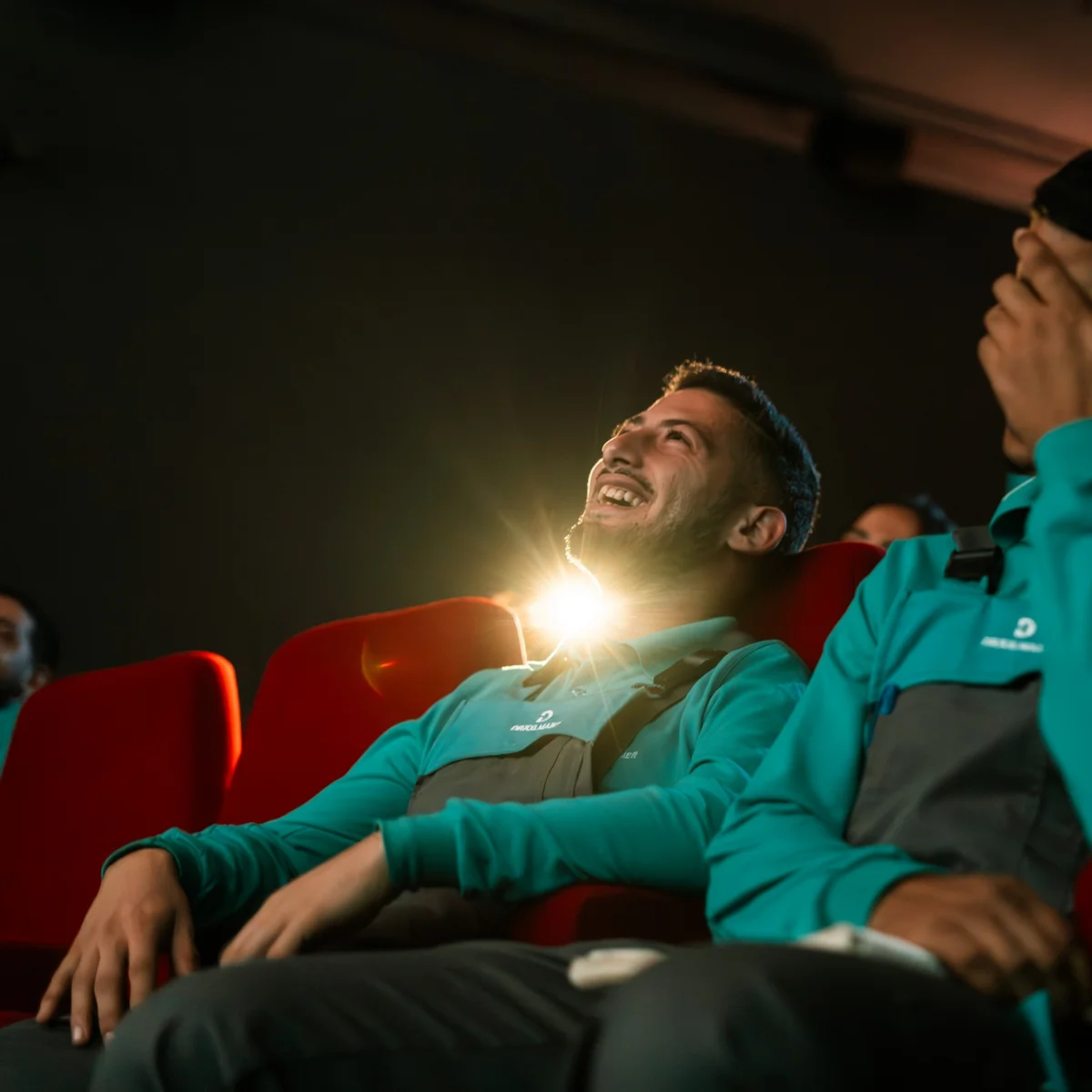 Dräxlmaier Mitarbeiter im Kino